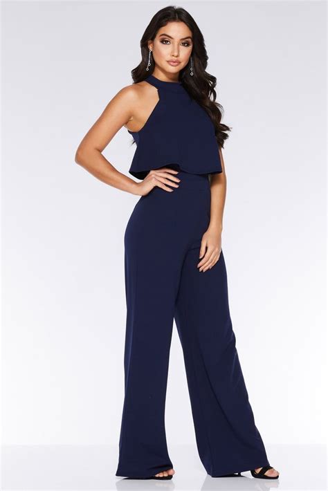 navy overlay high neck jumpsuit.